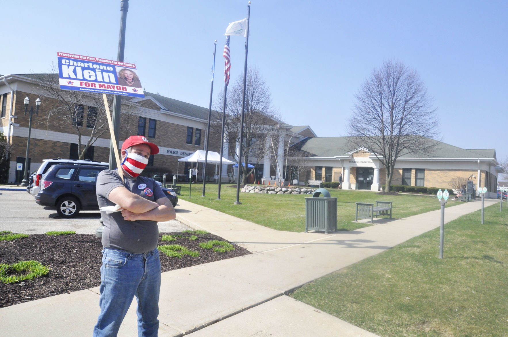 Charlene Klein backer campaigns outside City Hall